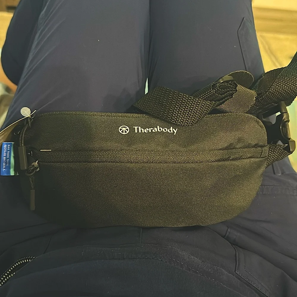 United first class Therabody crossbody bag unused and unopened